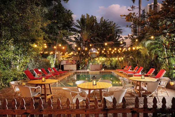 Pool at Freehand Miami, the best hostel in Miami Beach, with tropical gardens and social lounge area for travelers