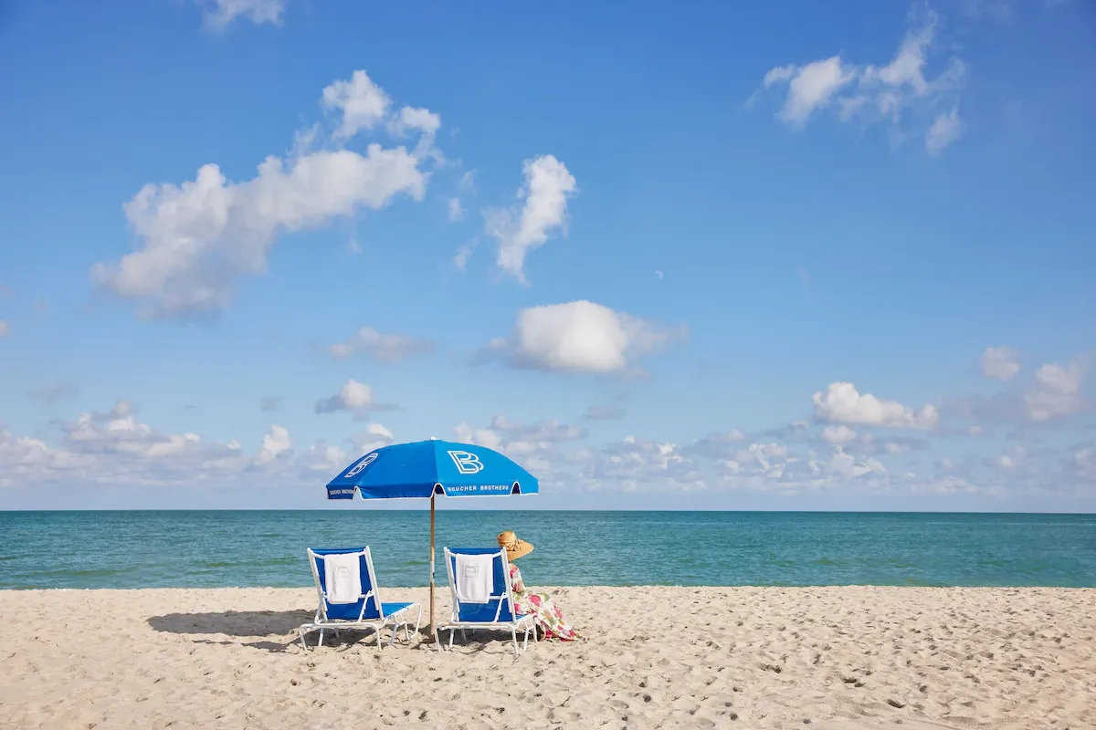 Beachfront loungers at The Betsy Hotel in South Beach, showing a calm oceanfront setting ideal for couples, solo travelers, and relaxed family stays.