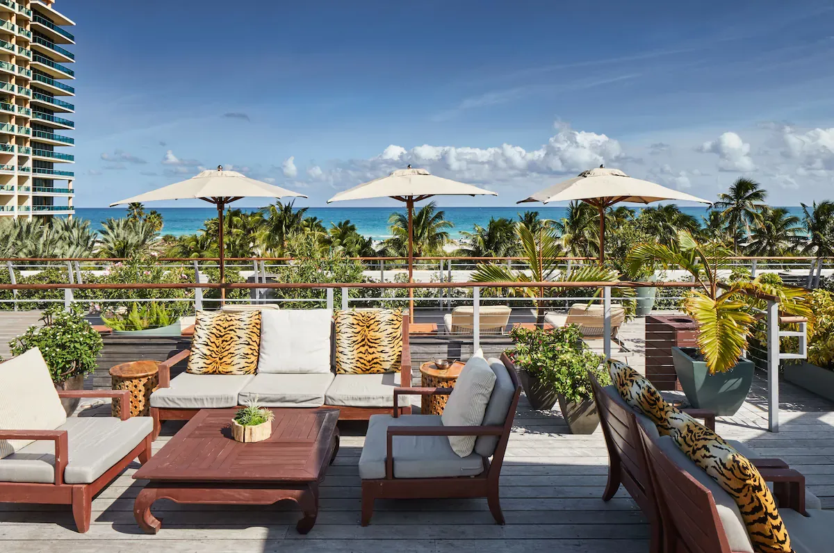 Outdoor beachfront terrace at The Betsy Hotel in South Beach, Miami Beach Florida — ocean-view seating and lounge space near the beach.