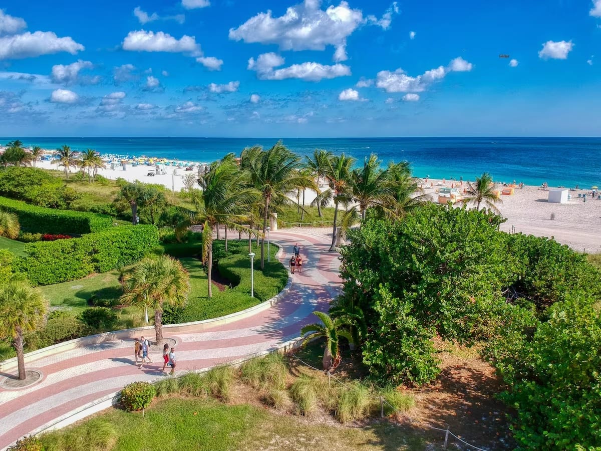 South Beach boardwalk and beach near The Betsy Hotel on Ocean Drive, Miami Beach Florida — central beachfront location for first-time visitors
