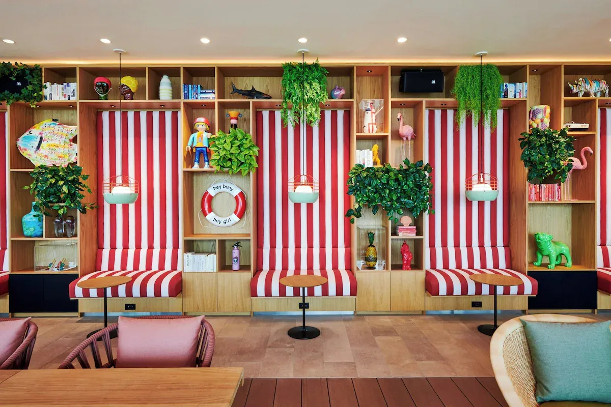 Lobby at CitizenM Miami Worldcenter designed for digital nomads, featuring quiet lounge seating, modern design, and work-friendly social spaces.