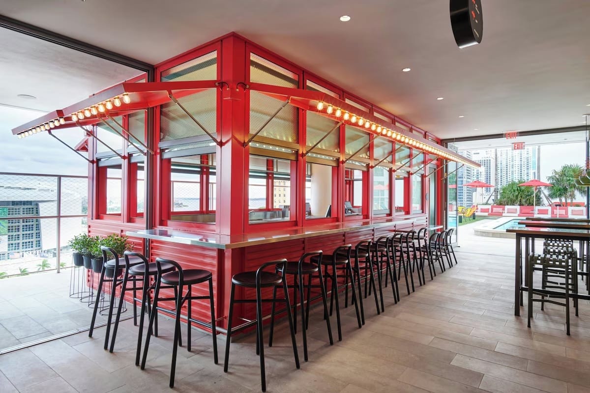 Rooftop bar at CitizenM Miami Worldcenter offering light social energy and skyline views for digital nomads and long-stay remote workers
