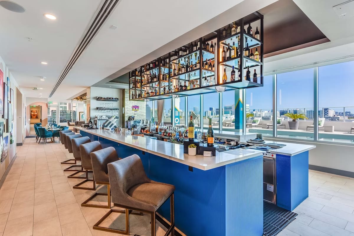 SKYE Rooftop Bar at SERENA Hotel Aventura with sunset views and outdoor lounge seating