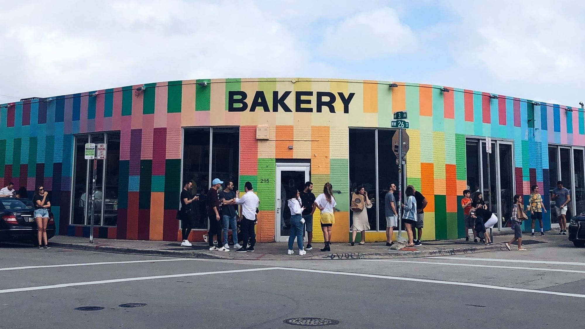 Zak the Baker Wynwood bakery exterior colorful mural Miami line outside