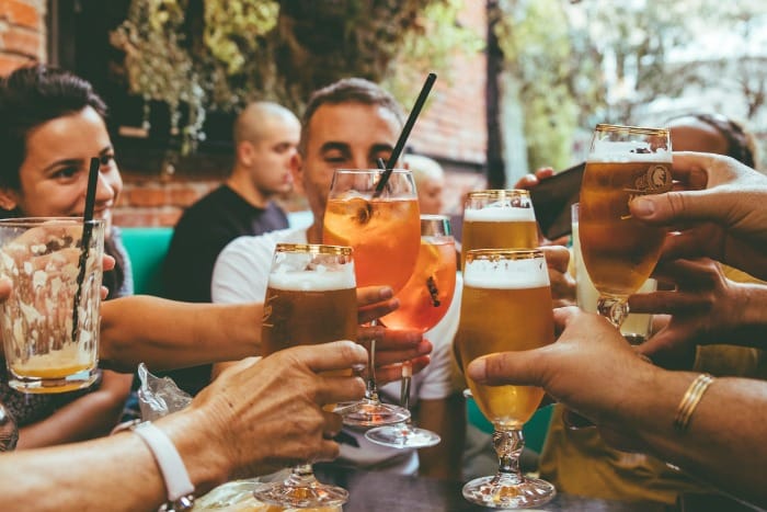 Singles toasting drinks at Moxy Miami Wynwood hotel