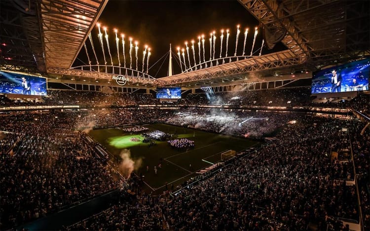 Miami Stadium at night with fireworks during a major soccer event, host venue for the 2026 World Cup in Miami.