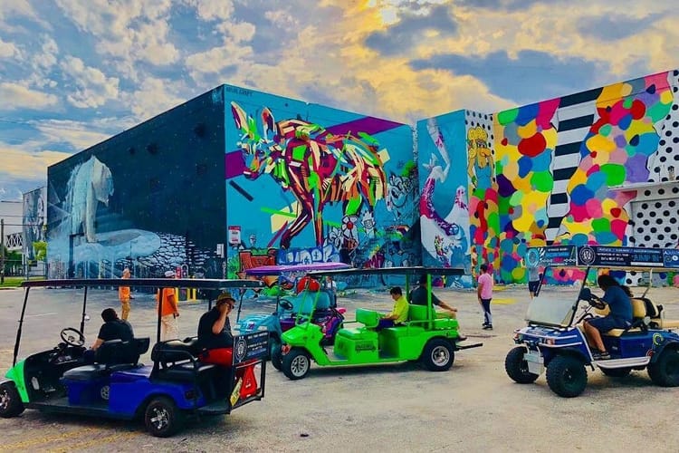 Guided Wynwood buggy tour exploring large-scale murals near the Wynwood Walls in Miami