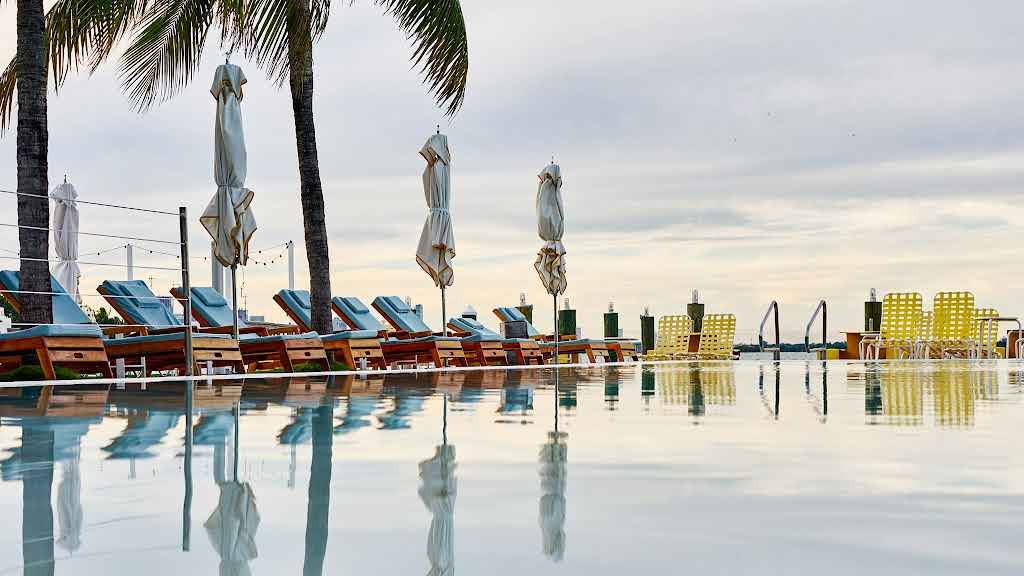 Quiet luxury pool at The Standard Spa Miami Beach overlooking Biscayne Bay