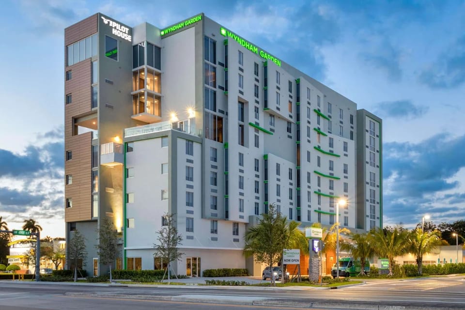 Exterior view of Wyndham Garden Miami International Airport hotel near Miami International Airport with modern design and airport access.
